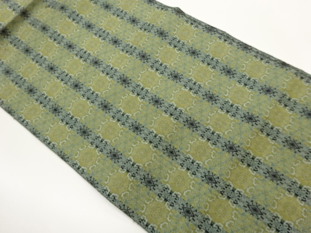 縞に華紋・菱模様織出し名古屋帯